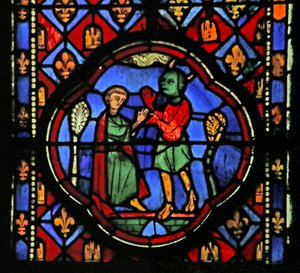 Window depicting Theophilus negotiating with a demon by French School